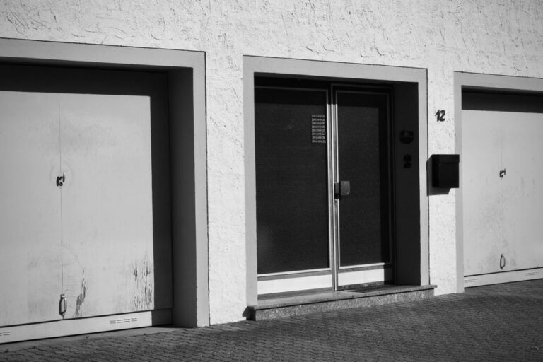 Garage Door Replacement Cost 2026: Materials, Openers & ROI
